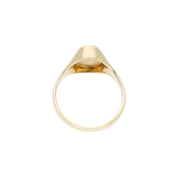 Anillo tipo sello con ónix en oro amarillo 14 kilates.