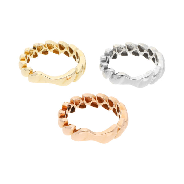 Tres anillos ondulados en oro tres tonos 14 kilates.