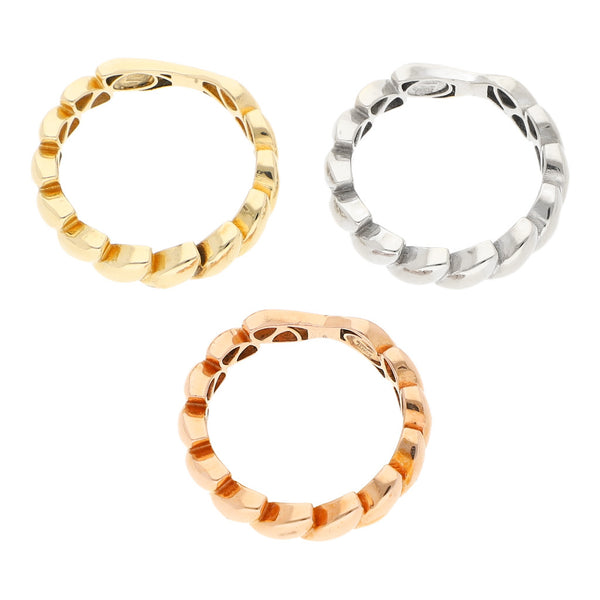 Tres anillos ondulados en oro tres tonos 14 kilates.
