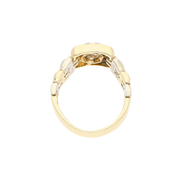 Anillo articulado con sinteticos en oro dos tonos 14 kilates.