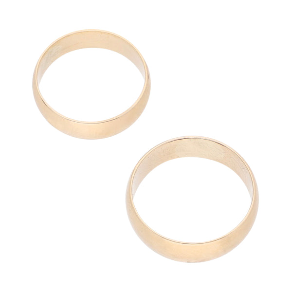 Dos argollas lisas en oro amarillo 14 kilates.