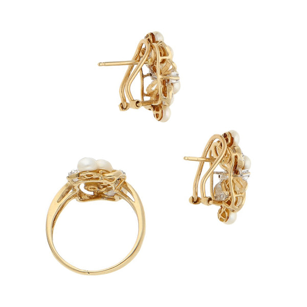 Juego de anillo y aretes diseño espcecial con diamantes y perlas en oro amarillo 14 kilates.