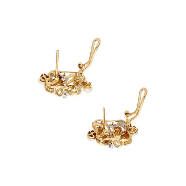 Juego de anillo y aretes diseño espcecial con diamantes y perlas en oro amarillo 14 kilates.