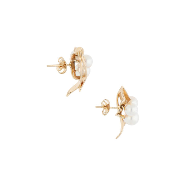 Broqueles diseño especial con perlas en oro amarillo 14 kilates.