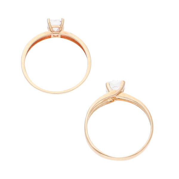 Dos anillos de compromiso con sintéticos en oro rosa 14 kilates.