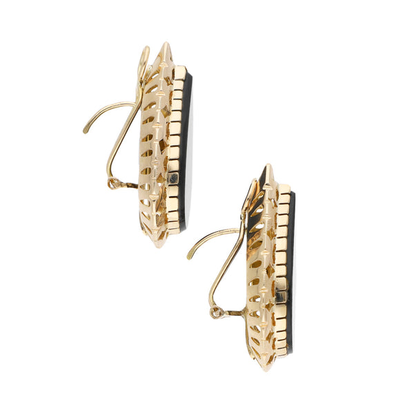 Aretes calados con ónix en oro amarillo 14 kilates.