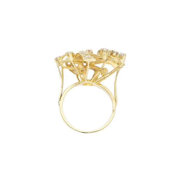 Anillo diseño especial con sintéticos en oro amarillo 14 kilates.