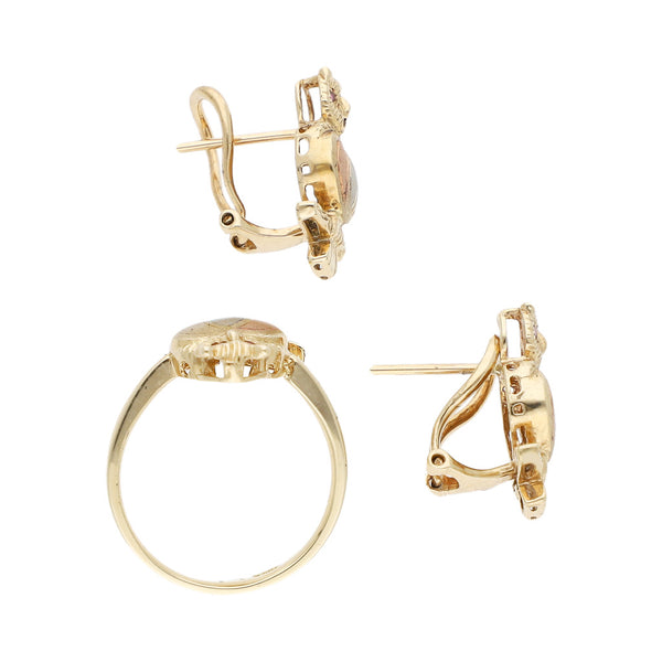 Juego de anillo y aretes diseño especial con sintéticos motivo búho en oro tres tonos 14 kilates.