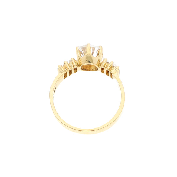 Anillo de compromiso con sintéticos en oro amarillo 14 kilates.