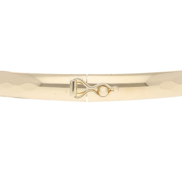 Pulsera de arillo facetada en oro amarillo 14 kilates.