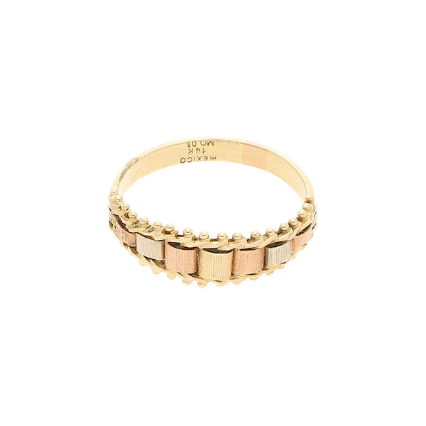 Anillo boleado en oro tres tonos 14 kilates.