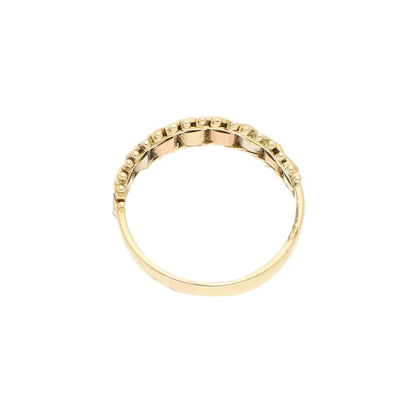 Anillo boleado en oro tres tonos 14 kilates.