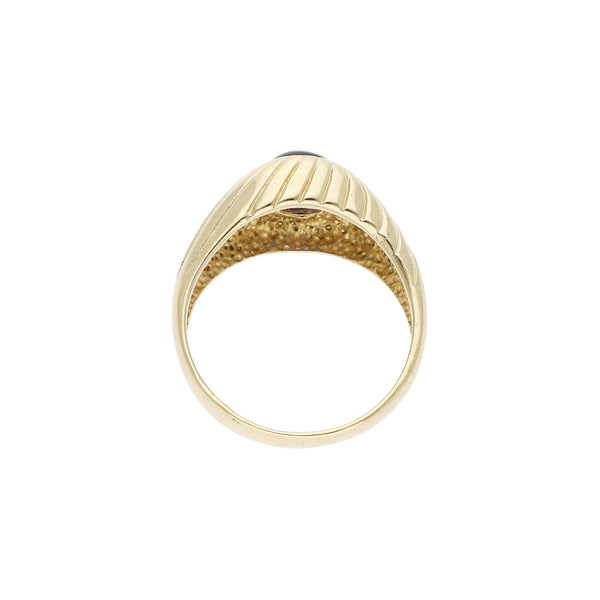 Anillo con sintético en oro amarillo 14 kilates.