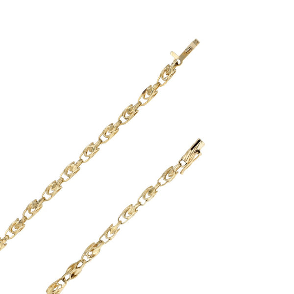 Collar calado en oro amarillo 12 kilates.