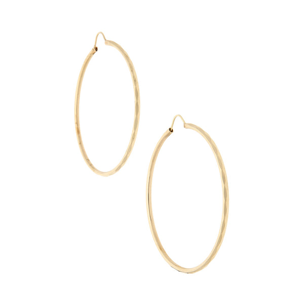 Arracadas facetadas en oro amarillo 14 kilates.