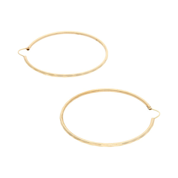 Arracadas facetadas en oro amarillo 14 kilates.