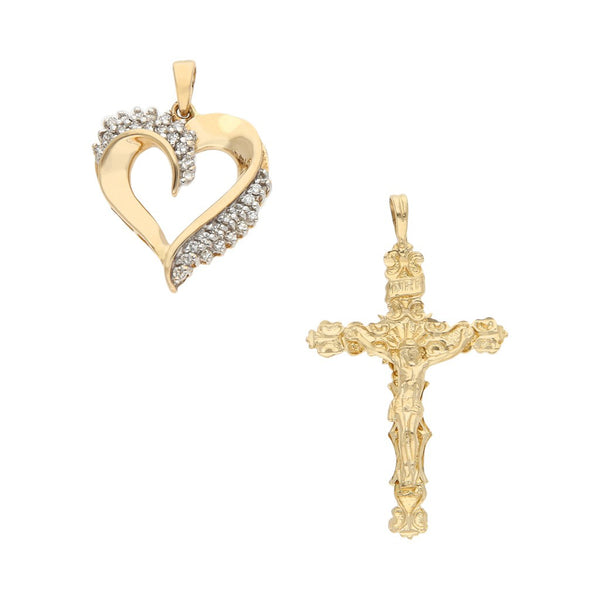 Dije diseño especial con diamantes motivo corazón y crucifijo labrado en oro amarillo 14 kilates.