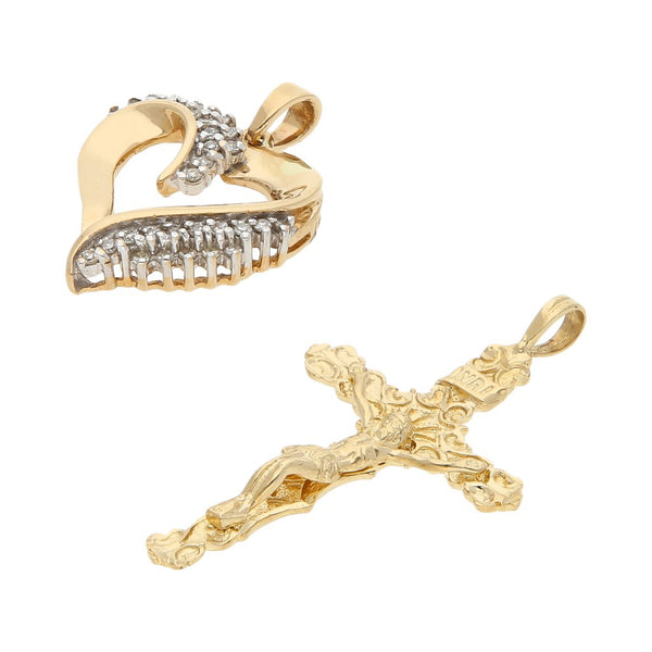 Dije diseño especial con diamantes motivo corazón y crucifijo labrado en oro amarillo 14 kilates.