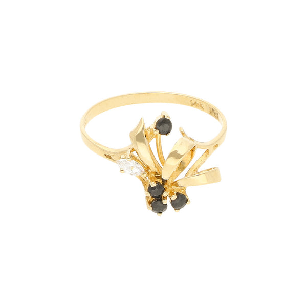 Anillo calado con sintéticos en oro amarillo 14 kilates.