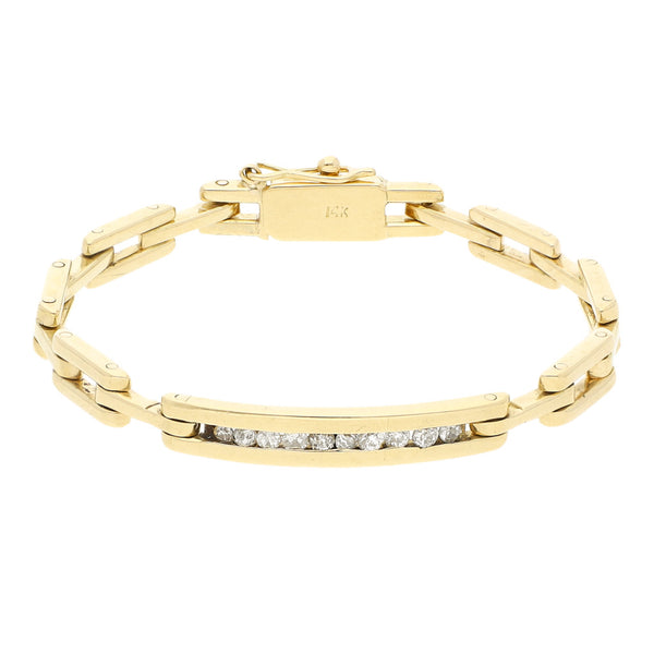 Esclava eslabón articulado con diamantes en oro amarillo 14 kilates.