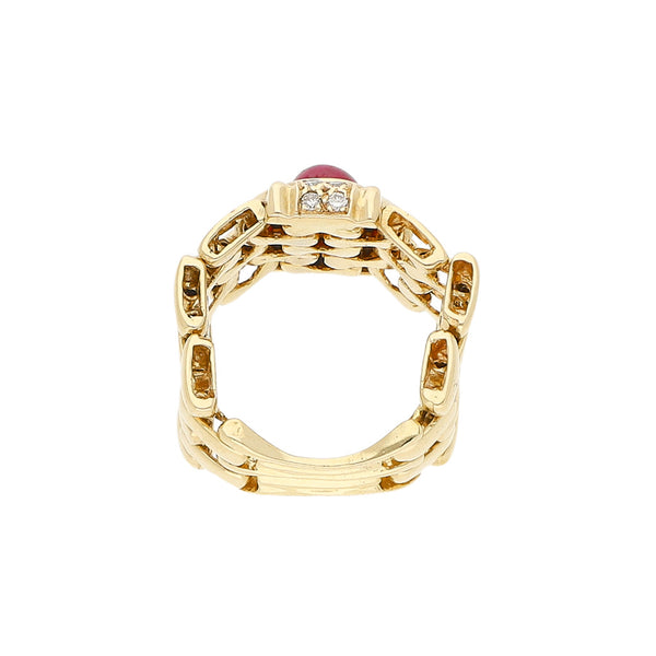 Anillo articulado con diamantes y sintético en oro amarillo 14 kilates.