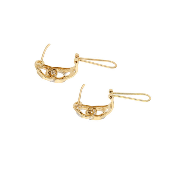 Juego de anillo y aretes diseño especial con circonias en oro amarillo 14 kilates.
