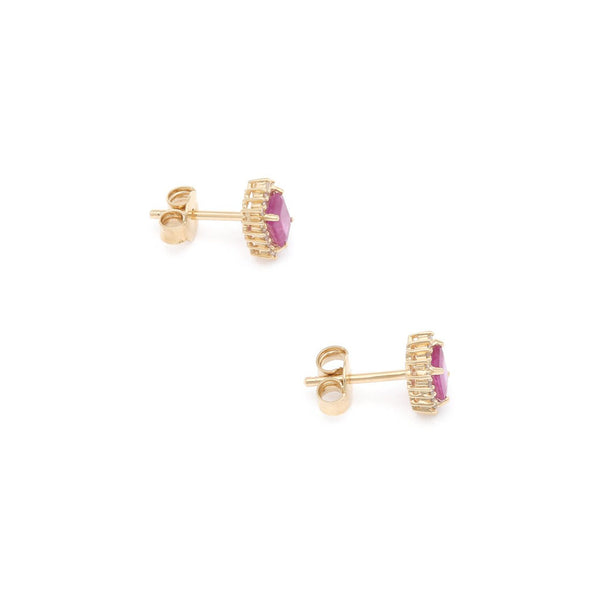 Aretes diseño especial con diamantes y rubí en oro amarillo 14 kilates.