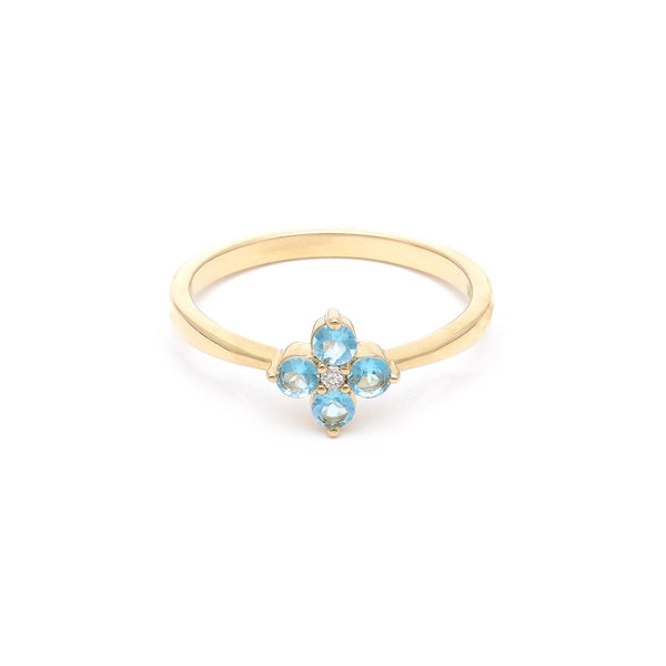 Anillo diseño especial con diamantes y topacio en oro amarillo 14 kilates.