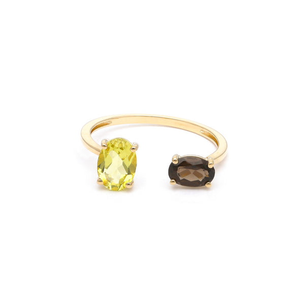 Anillo abierto con topacios en oro amarillo 14 kilates.