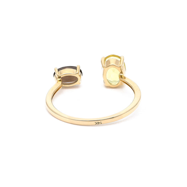Anillo abierto con topacios en oro amarillo 14 kilates.