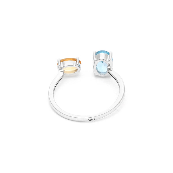 Anillo abierto con topacio y citrina en oro blanco 14 kilates.