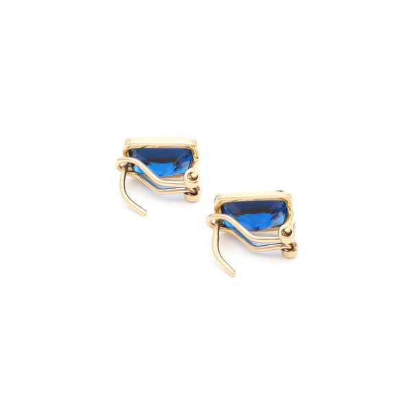 Aretes diseño especial con zafiros en oro amarillo 14 kilates.