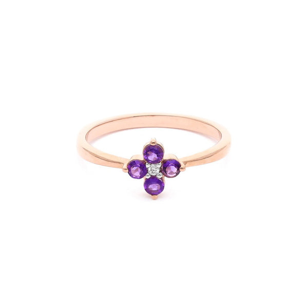 Anillo diseño especial con diamantes y amatista en oro rosa 14 kilates.