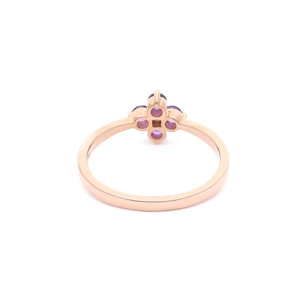 Anillo diseño especial con diamantes y amatista en oro rosa 14 kilates.