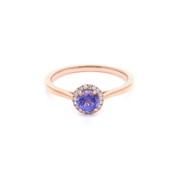 Anillo diseño especial con diamantes y tanzanita en oro rosa 14 kilates.