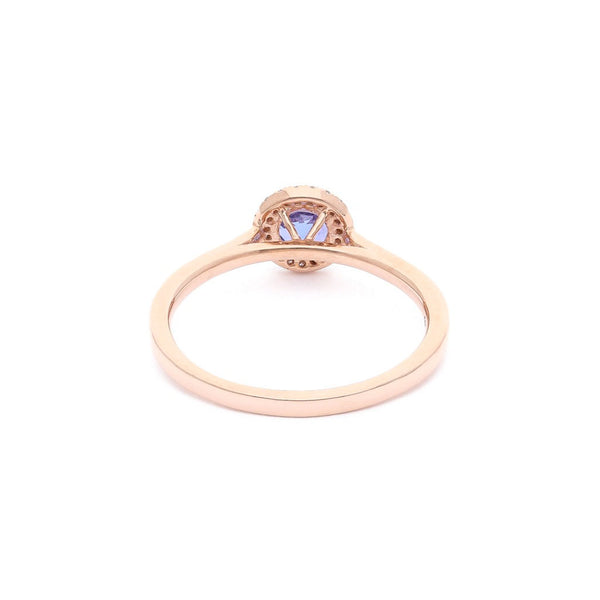 Anillo diseño especial con diamantes y tanzanita en oro rosa 14 kilates.