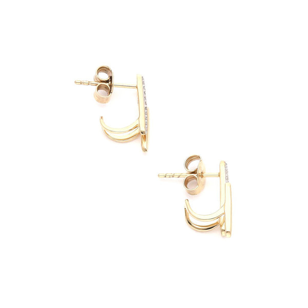 Aretes estilizados con diamantes en oro amarillo 14 kilates.
