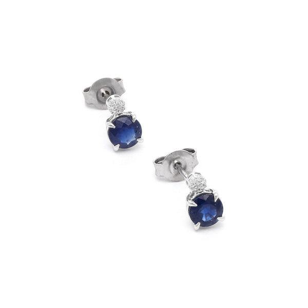 Aretes diseño especial con diamantes y zafiros en oro blanco 14 kilates.