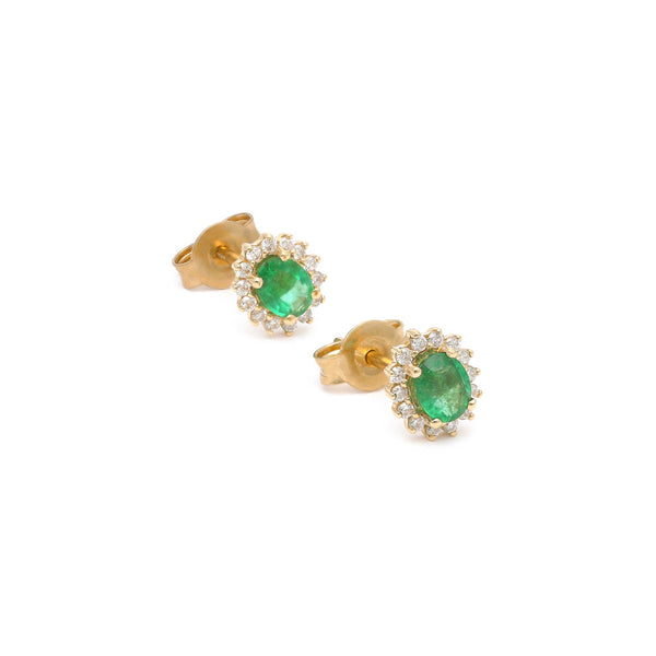 Aretes diseño especial con diamantes y esmeraldas en oro amarillo 14 kilates.
