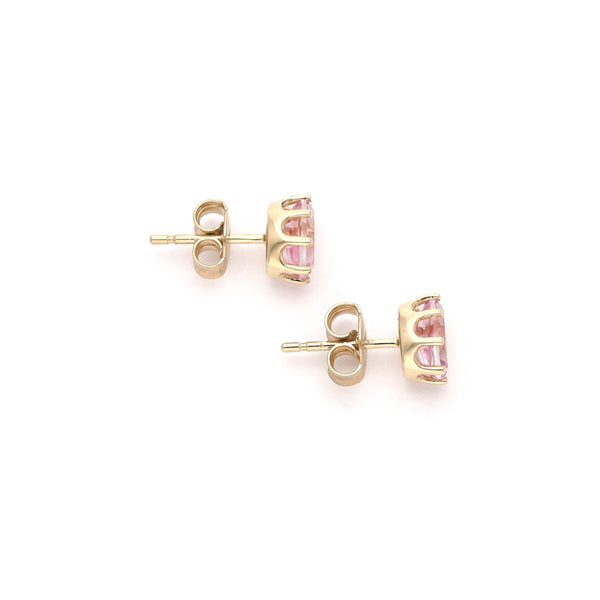 Aretes diseño especial con topacios en oro amarillo 14 kilates.