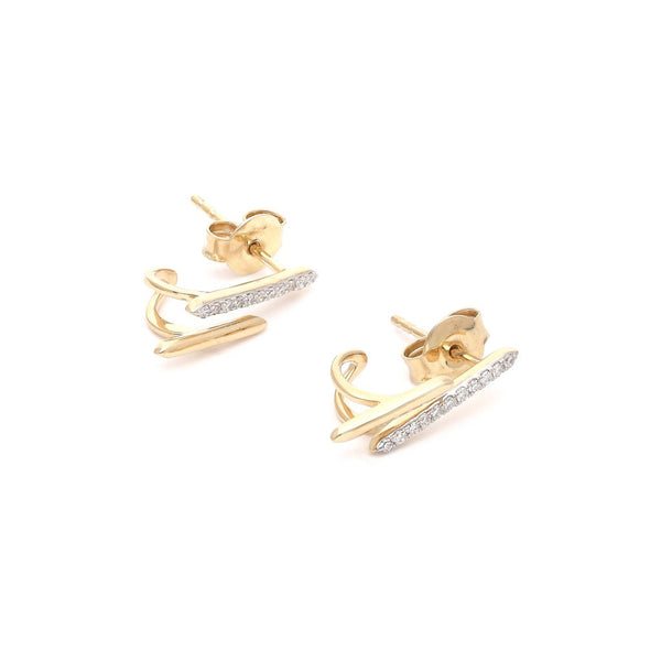 Aretes diseño especial con diamantes en oro amarillo 14 kilates.