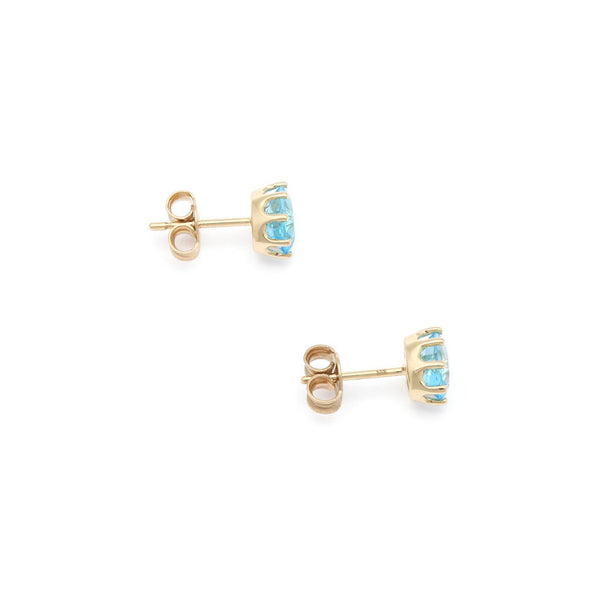 Aretes diseño especial con topacios en oro amarillo 14 kilates.