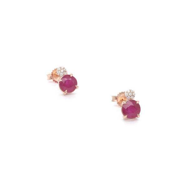 Aretes diseño especial con diamantes y rubíes en oro rosa 14 kilates.