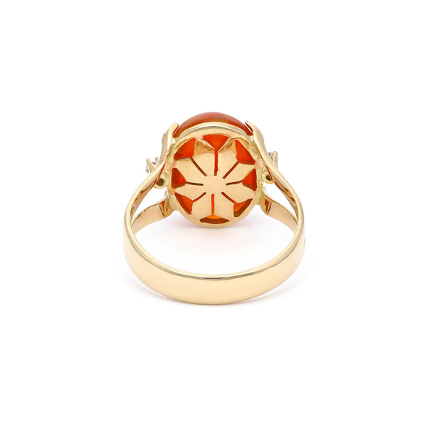 Anillo diseño especial con diamantes y ópalo en oro amarillo 14 kilates.