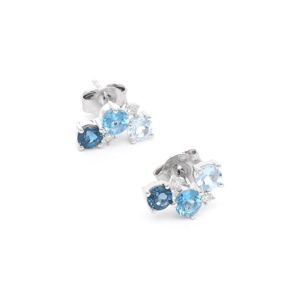 Aretes diseño especial con topacios y circonias en oro blanco 14 kilates.