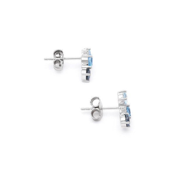 Aretes diseño especial con topacios y circonias en oro blanco 14 kilates.