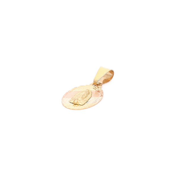 Medalla facetada motivo Virgen de Guadalupe en oro amarillo 14 kilates.