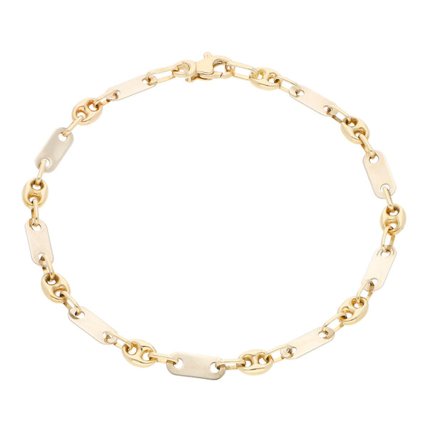 Pulsera eslabón combinado en oro dos tonos 14 kilates.