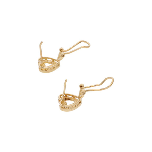 Aretes diseño especial con circonias motivo corazón en oro amarillo 14 kilates.