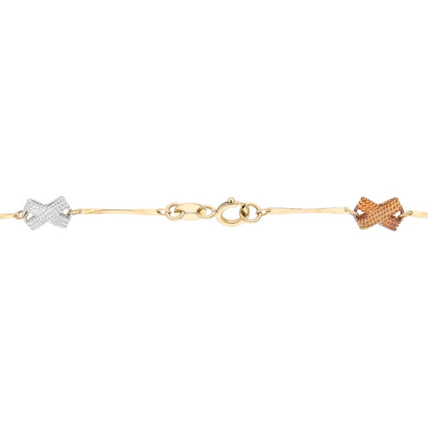 Pulsera eslabón articulado en oro tres tonos 14 kilates.